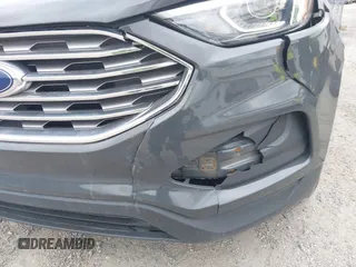 2021 Ford Edge SE with VIN 2FMPK4G97MBA50768, listed as a IAAI auction lot 42748557 with 89,523 mi miles and . Bid and sale history available at DreamBid. Image 18.