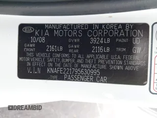 2009 Kia Spectra EX with VIN KNAFE221795630995, listed as a IAAI auction lot 41928252 with 126,694 mi miles. Bid and sale history available at carsss.com. Image 9.