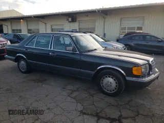 1991 Mercedes-Benz 560 with VIN WDBCA39E8MA567307, listed as a Copart auction lot 77488244 with 202,305 mi miles and Clean Title. Bid and sale history available at DreamBid. Image 4.