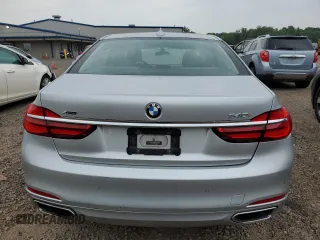 2018 BMW 7 Series 740i xDrive with VIN WBA7E4C56JGV23835, listed as a Copart auction lot 55254573 with 103,713 mi miles. Bid and sale history available at carsss.com. Image 6.