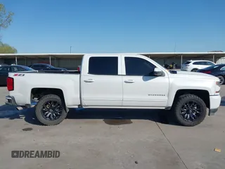 2016 Chevrolet Silverado 1500 LT with VIN 3GCUKREC8GG366278, listed as a IAAI auction lot 41993038 with 176,515 mi miles and . Bid and sale history available at DreamBid. Image 13.