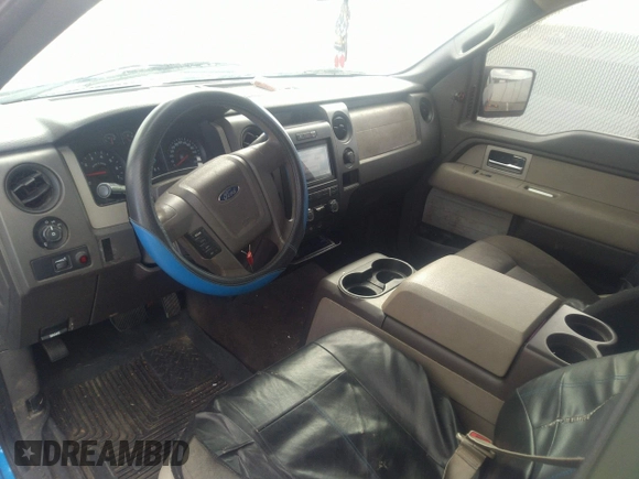 2009 Ford F-150 STX with VIN 1FTRX14849FA11909, listed as a IAAI auction lot 40979039 with 162,013 mi miles. Bid and sale history available at carsss.com. Image 5.