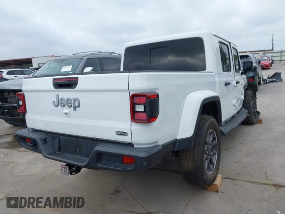 2021 Jeep Gladiator High Altitude with VIN 1C6HJTFG8ML551570, listed as a IAAI auction lot 42229235 with 56,959 mi miles and . Bid and sale history available at DreamBid. Image 4.