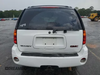 2008 GMC Envoy SLE2 with VIN 1GKDT13S482138883, listed as a Copart auction lot 60243614 with 232,037 mi miles and Salvage Title. Bid and sale history available at DreamBid. Image 6.