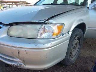2001 Toyota Camry LE z VIN JT2BF22K710334750, wystawiony jako IAAI lot #42422525 z przebiegiem 273 999 mil mil oraz . Historia ofert i sprzedaży dostępna na DreamBid. Obrazek 11.