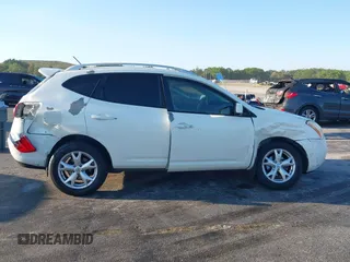 2009 Nissan Rogue SL with VIN JN8AS58T79W329674, listed as a IAAI auction lot 41833891 with 170,396 mi miles and . Bid and sale history available at DreamBid. Image 14.