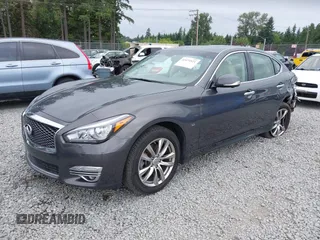 2015 Infiniti Q70 with VIN JN1BY1ARXFM562111, listed as a IAAI auction lot 42473521 with 123,212 mi miles and . Bid and sale history available at DreamBid. Image 2.