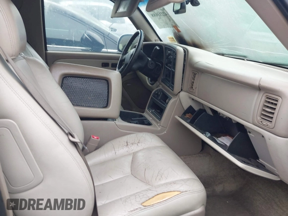 2003 Chevrolet Tahoe LS z VIN 1GNEC13Z73J164865, wystawiony jako IAAI lot #42213688 z przebiegiem Nie podano mil oraz . Historia ofert i sprzedaży dostępna na DreamBid. Obrazek 5.