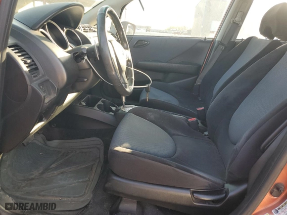 2008 Honda Fit Sport with VIN JHMGD38658S056138, listed as a Copart auction lot 52579185 with 124,039 mi miles and Clean Title. Bid and sale history available at carsss.com. Image 7.