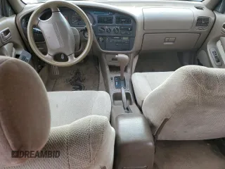 1994 Toyota Camry z VIN 4T1SK12W5RU365849, wystawiony jako Copart lot #44363565 z przebiegiem 226 124 mil mil oraz Szkoda całkowita • Salvage title. Historia ofert i sprzedaży dostępna na DreamBid. Obrazek 8.