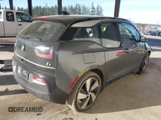2019 BMW i3 with VIN WBY8P4C51K7E52192, listed as a IAAI auction lot 41696266 with 44,030 mi miles and . Bid and sale history available at DreamBid. Image 4.
