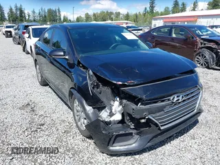 2021 Hyundai Accent SE z VIN 3KPC24A68ME131773, wystawiony jako IAAI lot #42384396 z przebiegiem 155 697 mil mil oraz . Historia ofert i sprzedaży dostępna na DreamBid. Obrazek 1.