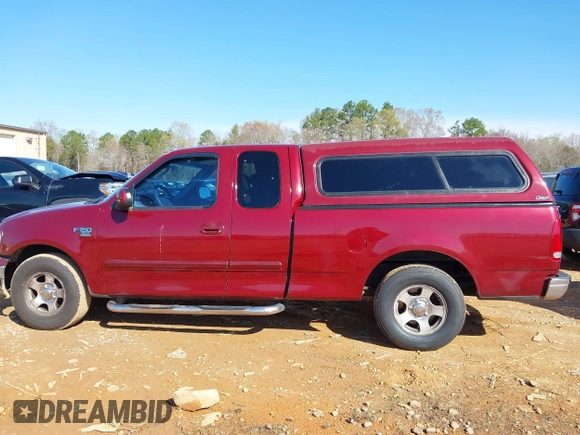 2003 Ford F-150 XL with VIN 1FTRX17W43NA07186, listed as a IAAI auction lot 41864354 with 123,565 mi miles. Bid and sale history available at carsss.com. Image 14.