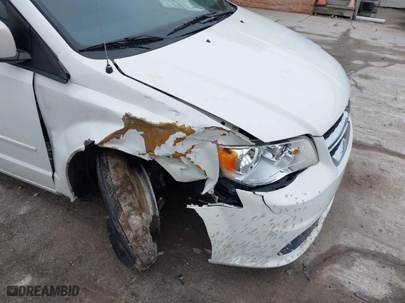2011 Dodge Grand Caravan Mainstreet with VIN 2D4RN3DG7BR640199, listed as a IAAI auction lot 38633071 with 148,846 mi miles. Bid and sale history available at carsss.com. Image 6.
