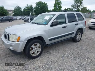 2005 Jeep Grand Cherokee Laredo z VIN 1J4GR48K45C724808, wystawiony jako IAAI lot #42722305 z przebiegiem 149 112 mil mil oraz . Historia ofert i sprzedaży dostępna na DreamBid. Obrazek 2.