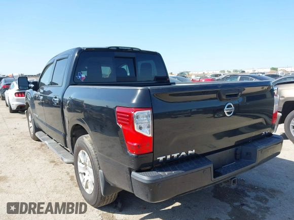 2017 Nissan Titan SV with VIN 1N6AA1E68HN535917, listed as a IAAI auction lot 41974261 with 162,561 mi miles and . Bid and sale history available at DreamBid. Image 3.