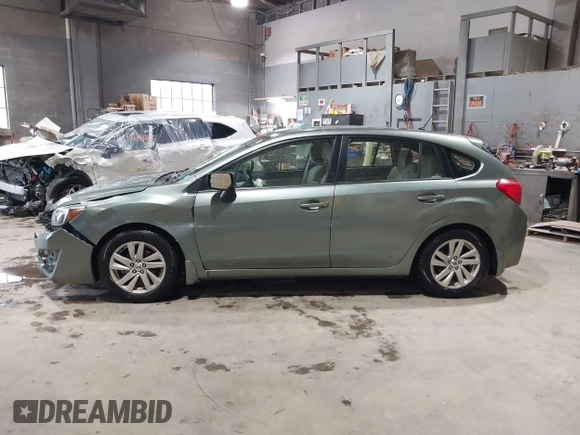2015 Subaru Impreza Premium z VIN JF1GPAC60FH251553, wystawiony jako IAAI lot #42330354 z przebiegiem 99 830 mil mil oraz . Historia ofert i sprzedaży dostępna na DreamBid. Obrazek 14.