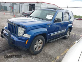 2010 Jeep Liberty Sport z VIN 1J4PN2GK4AW180109, wystawiony jako IAAI lot #42155603 z przebiegiem 158 514 mil mil oraz . Historia ofert i sprzedaży dostępna na DreamBid. Obrazek 2.