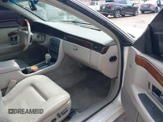 2002 Cadillac Eldorado ESC z VIN 1G6EL12Y92B100484, wystawiony jako IAAI lot #42418094 z przebiegiem 167 293 mil mil oraz . Historia ofert i sprzedaży dostępna na DreamBid. Obrazek 5.