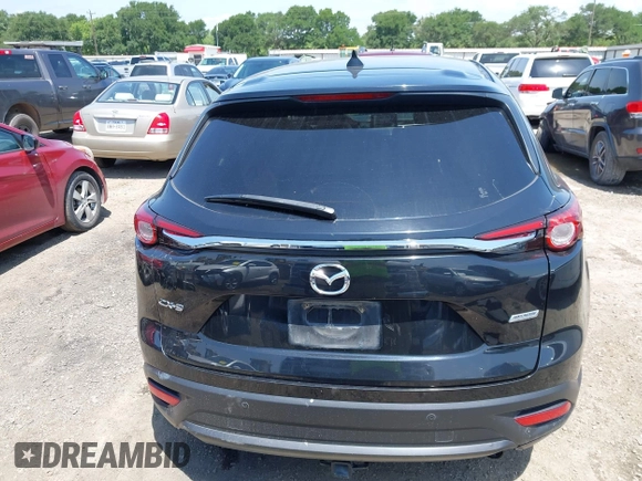 2016 Mazda CX-9 Touring with VIN JM3TCACY7G0101632, listed as a IAAI auction lot 42191115 with 163,070 mi miles and . Bid and sale history available at DreamBid. Image 16.
