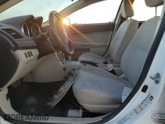 2010 Mitsubishi Lancer DE with VIN JA32U1FU2AU023608, listed as a Copart auction lot 77461714 with 132,895 mi miles and Salvage Title. Bid and sale history available at DreamBid. Image 7.