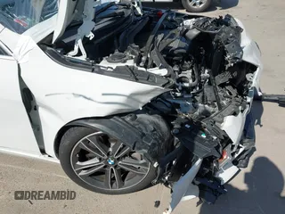 2021 BMW 2 Series 228i with VIN WBA53AK06M7J27877, listed as a IAAI auction lot 41956951 with 37,321 mi miles and . Bid and sale history available at DreamBid. Image 19.