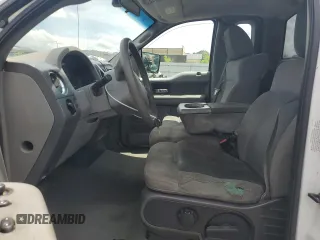2005 Ford F-150 XL with VIN 1FTVF12585NA40842, listed as a Copart auction lot 61728465 with 288,002 mi miles and Salvage title. Bid and sale history available at DreamBid. Image 7.