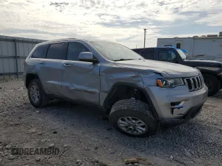 2018 Jeep Grand Cherokee Laredo with VIN 1C4RJFAG4JC122038, listed as a Copart auction lot 54351465 with 101,314 mi miles and Salvage title. Bid and sale history available at DreamBid. Image 4.