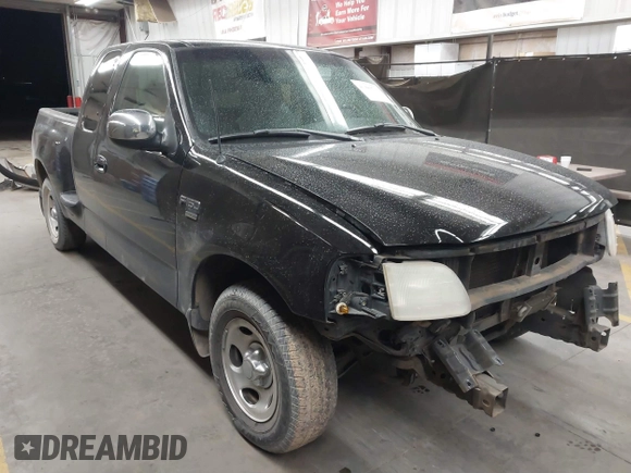 2001 Ford F-150 XL with VIN 1FTRX07W61KF82074, listed as a IAAI auction lot 41444721 with 125,494 mi miles. Bid and sale history available at carsss.com. Image 1.
