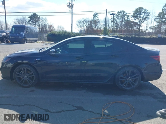2018 Acura TLX w/A-SPEC Pkg z VIN 19UUB3F67JA001068, wystawiony jako IAAI lot #41598159 z przebiegiem 98 518 mil mil oraz . Historia ofert i sprzedaży dostępna na DreamBid. Obrazek 14.