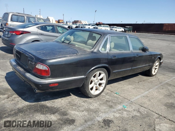 2003 Jaguar XJ with VIN SAJDA15B63MF52618, listed as a Copart auction lot 64336415 with Not provided miles and Clean title. Bid and sale history available at DreamBid. Image 3.
