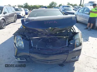 2012 Cadillac CTS Premium z VIN 1G6DP1E3XC0116593, wystawiony jako IAAI lot #42138575 z przebiegiem 198 884 mil mil oraz . Historia ofert i sprzedaży dostępna na DreamBid. Obrazek 12.