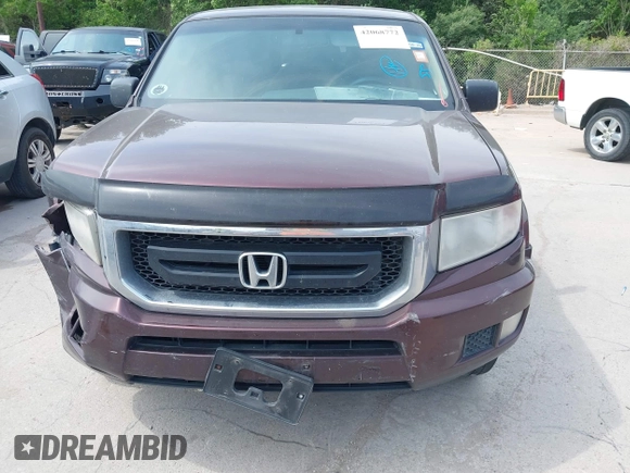 2009 Honda Ridgeline RT with VIN 5FPYK16239B109716, listed as a IAAI auction lot 42068772 with 206,649 mi miles. Bid and sale history available at carsss.com. Image 12.