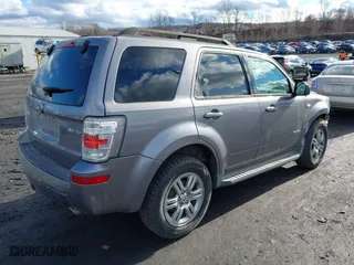 2008 Mercury Mariner with VIN 4M2CU91168KJ37290, listed as a IAAI auction lot 41199062 with 142,232 mi miles. Bid and sale history available at carsss.com. Image 4.