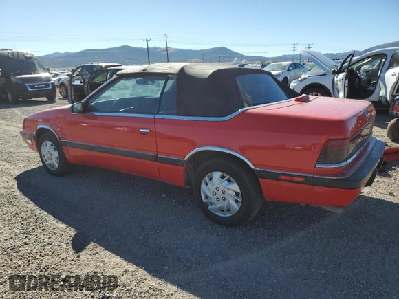 1989 Chrysler LeBaron z VIN 1C3XJ55J9KG275438, wystawiony jako Copart lot #73026764 z przebiegiem 118 347 mil mil oraz Tytuł czysty. Historia ofert i sprzedaży dostępna na DreamBid. Obrazek 2.