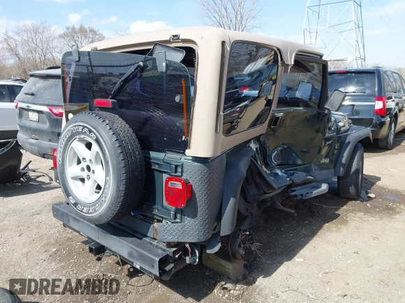 2002 Jeep Wrangler Sport with VIN 1J4FA49S62P743771, listed as a IAAI auction lot 41791205 with 186,622 mi miles. Bid and sale history available at carsss.com. Image 6.