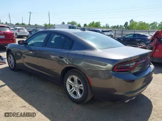 2023 Dodge Charger SXT with VIN 2C3CDXBG4PH515632, listed as a IAAI auction lot 42000682 with 56,163 mi miles. Bid and sale history available at carsss.com. Image 3.