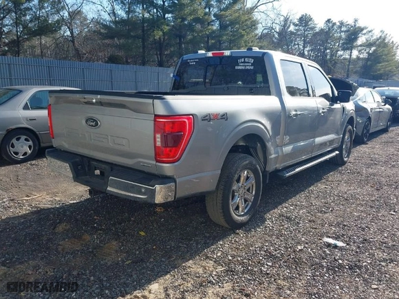 2021 Ford F-150 XL with VIN 1FTFW1E85MKD11754, listed as a IAAI auction lot 41654622 with 33,756 mi miles. Bid and sale history available at carsss.com. Image 4.
