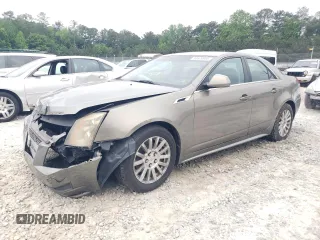 2011 Cadillac CTS with VIN 1G6DA5EYXB0137933, listed as a Copart auction lot 54679985 with 222,010 mi miles and Clean Title. Bid and sale history available at DreamBid. Image 1.
