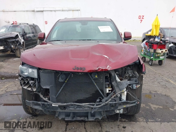 2018 Jeep Grand Cherokee Laredo E with VIN 1C4RJFAG6JC256341, listed as a IAAI auction lot 41635752 with 52,184 mi miles and . Bid and sale history available at DreamBid. Image 13.