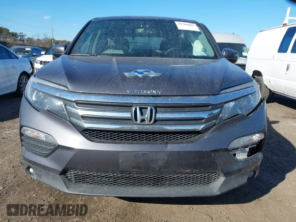 2017 Honda Pilot EX-L with VIN 5FNYF6H59HB101815, listed as a IAAI auction lot 41704661 with 130,479 mi miles and . Bid and sale history available at DreamBid. Image 12.