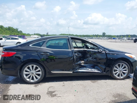 2013 Hyundai Azera z VIN KMHFH4JG0DA310957, wystawiony jako IAAI lot #42451780 z przebiegiem 82 827 mil mil oraz . Historia ofert i sprzedaży dostępna na DreamBid. Obrazek 13.