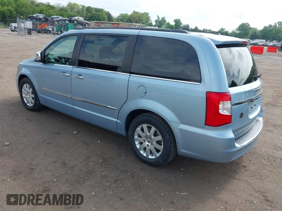 2012 Chrysler Town & Country Touring L with VIN 2C4RC1CG1CR393269, listed as a IAAI auction lot 42101848 with 144,881 mi miles and . Bid and sale history available at carsss.com. Image 3.