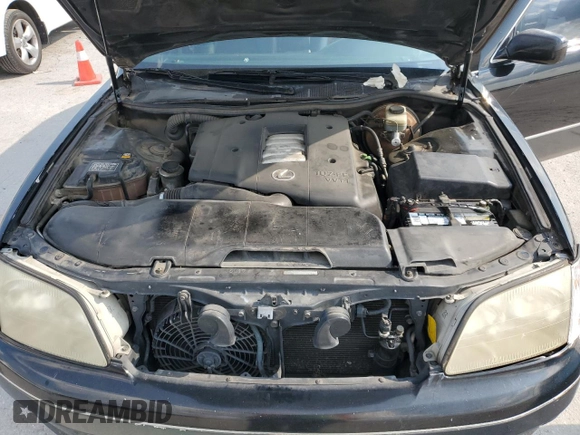 1999 Lexus LS 400 z VIN JT8BH28F7X0154767, wystawiony jako Copart lot #59838805 z przebiegiem 205 710 mil mil oraz Szkoda całkowita • Salvage title. Historia ofert i sprzedaży dostępna na DreamBid. Obrazek 11.