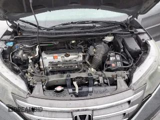 2013 Honda CR-V EX-L z VIN 2HKRM4H75DH668874, wystawiony jako Copart lot #55956255 z przebiegiem 136 539 mil mil oraz Szkoda całkowita • Salvage title. Historia ofert i sprzedaży dostępna na DreamBid. Obrazek 12.