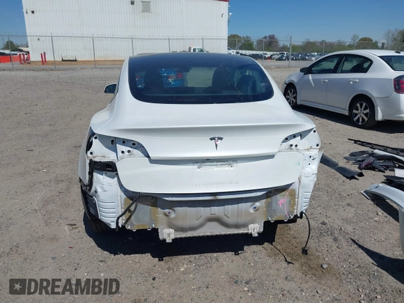 2023 Tesla Model 3 with VIN 5YJ3E1EA7PF592966, listed as a IAAI auction lot 41879794 with 13,423 mi miles and . Bid and sale history available at carsss.com. Image 17.