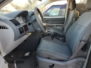 2010 Chrysler Town & Country LX with VIN 2A4RR4DE3AR344191, listed as a Copart auction lot 41399625 with 163,934 mi miles and Salvage Title. Bid and sale history available at DreamBid. Image 7.