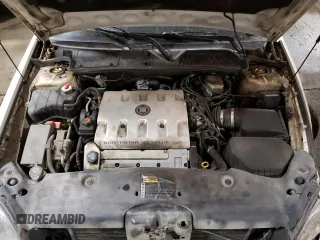 2001 Cadillac DeVille z VIN 1G6KD54Y31U294274, wystawiony jako Copart lot #46474844 z przebiegiem 147 396 mil mil oraz Nie do naprawy • Non repairable. Historia ofert i sprzedaży dostępna na DreamBid. Obrazek 11.