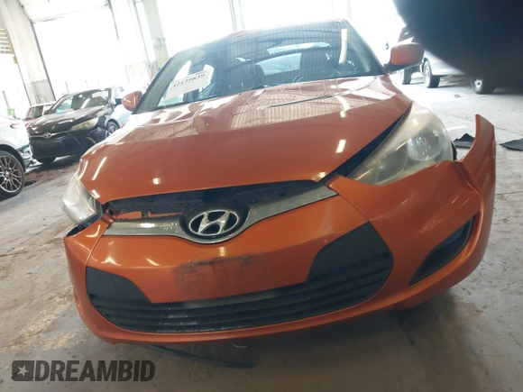 2013 Hyundai Veloster w/Black Int z VIN KMHTC6AD3DU143656, wystawiony jako IAAI lot #42139839 z przebiegiem 121 392 mil mil oraz . Historia ofert i sprzedaży dostępna na DreamBid. Obrazek 12.