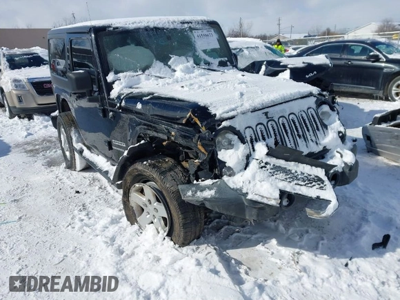 2014 Jeep Wrangler Sport with VIN 1C4AJWAG5EL285994, listed as a IAAI auction lot 41558673 with 98,779 mi miles and . Bid and sale history available at DreamBid. Image 1.